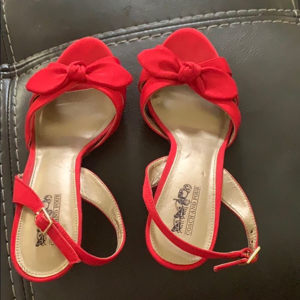 Super cute red coach and four heels
